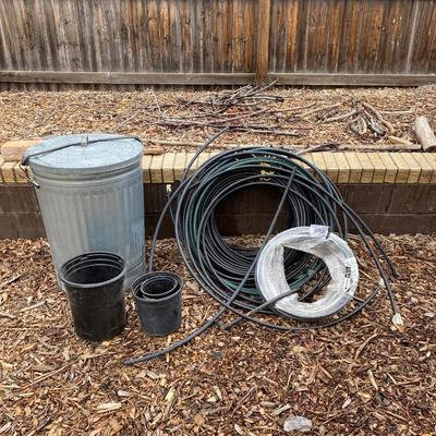 SPRINKLER LINE, METAL TRASH CAN AND MORE