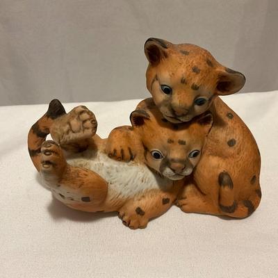 Curious Cougars, Masterpiece Porcelain figurine