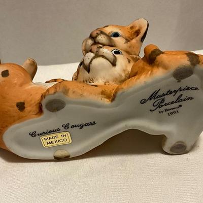 Curious Cougars, Masterpiece Porcelain figurine