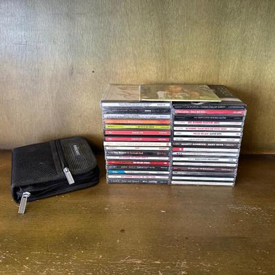 VARIETY OF MUSIC ON CD'S WITH CARRY CASE