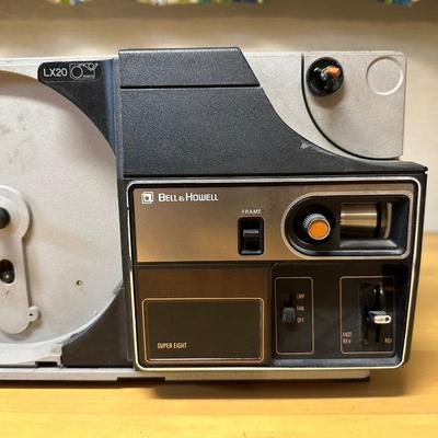 ROLLEI TRIPOD, BELL & HOWELL SUPER 8 MOVIE PROJECTOR AND CORDLESS SONOTRON