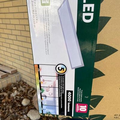 NEW GOOD EARTH 4â€™ FLAT PANEL LED LIGHT, IRONING BOARD AND DRYING RACK