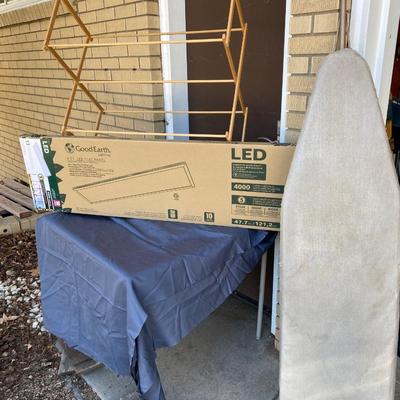 NEW GOOD EARTH 4â€™ FLAT PANEL LED LIGHT, IRONING BOARD AND DRYING RACK