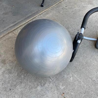 EXERCISE EQUIPMENT AND A BOX OF GOLF BALLS