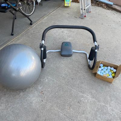 EXERCISE EQUIPMENT AND A BOX OF GOLF BALLS