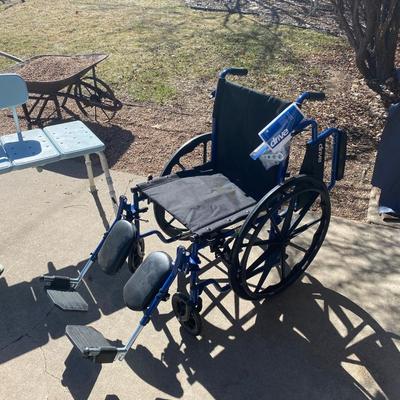 NEW WHEELCHAIR AND A SHOWER SEAT