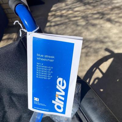 NEW WHEELCHAIR AND A SHOWER SEAT