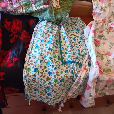 LADIES APRONS AND AN UMBRELLA