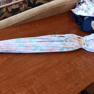 LADIES APRONS AND AN UMBRELLA