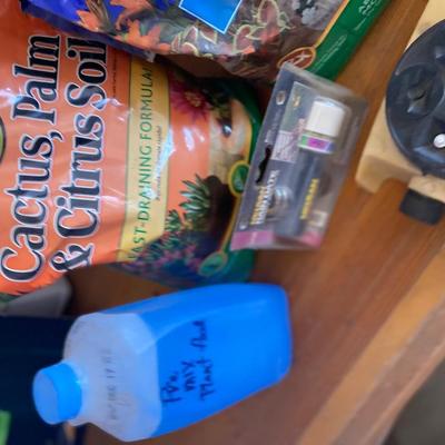 POTTING SOIL, AND CONDITIONER, PREMIXED PLANT FOOD AND MORE