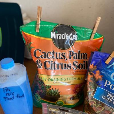 POTTING SOIL, AND CONDITIONER, PREMIXED PLANT FOOD AND MORE