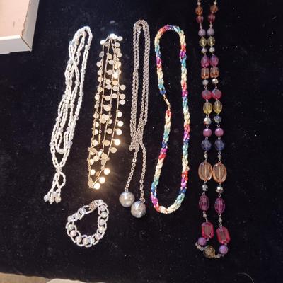 5 COSTUME NECKLACES AND 1 BRACELET