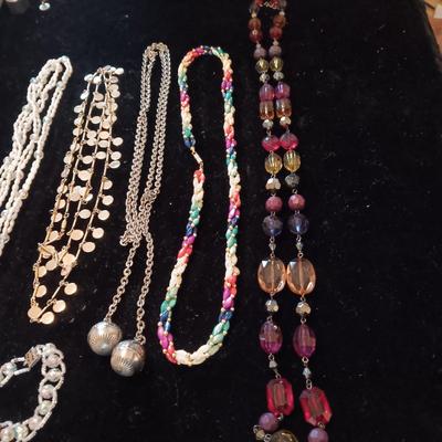 5 COSTUME NECKLACES AND 1 BRACELET