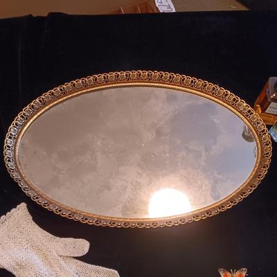 DRESSER MIRROR, VARIETY OF PERFUMES AND DRESS GLOVES