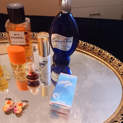 DRESSER MIRROR, VARIETY OF PERFUMES AND DRESS GLOVES