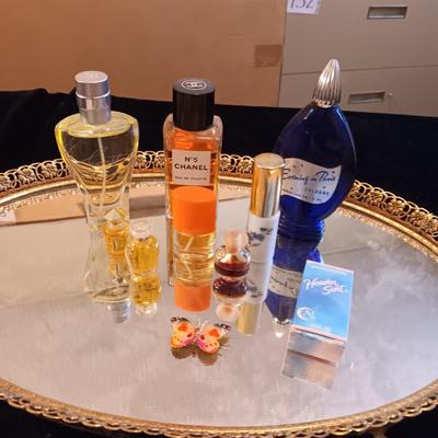 DRESSER MIRROR, VARIETY OF PERFUMES AND DRESS GLOVES