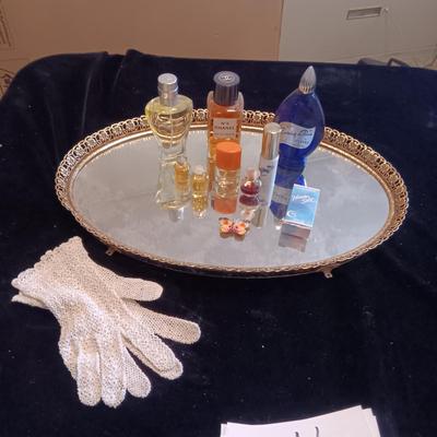 DRESSER MIRROR, VARIETY OF PERFUMES AND DRESS GLOVES
