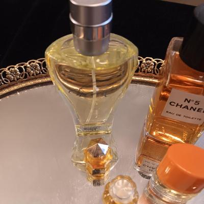 DRESSER MIRROR, VARIETY OF PERFUMES AND DRESS GLOVES