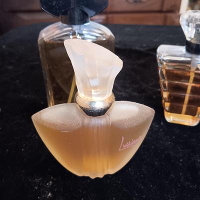 4 BOTTLES OF PERFUME