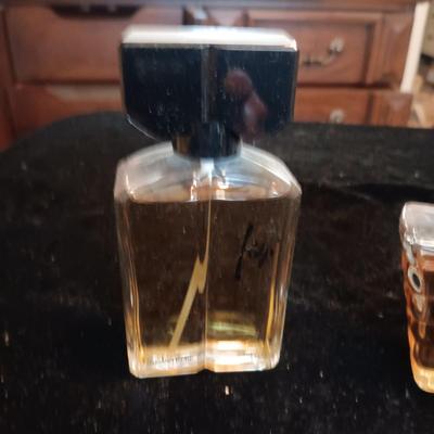 4 BOTTLES OF PERFUME