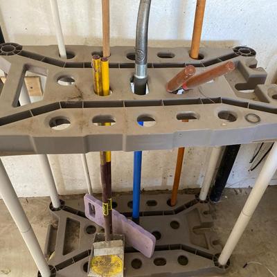 GARAGE/YARD TOOL ORGANIZER AND STARTER TOOL