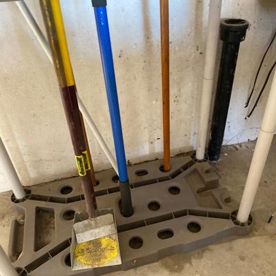 GARAGE/YARD TOOL ORGANIZER AND STARTER TOOL