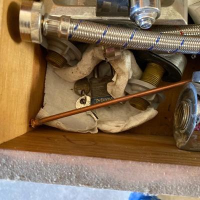 MISC DRAWER OF PLUMBING SUPPLIES AND 3/4 PIPE
