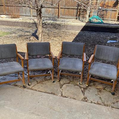 4 CHAIRS ON CASTERS