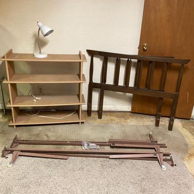 TWIN BED , BOOKSHELF AND LAMP