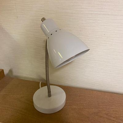 TWIN BED , BOOKSHELF AND LAMP