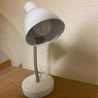 TWIN BED , BOOKSHELF AND LAMP