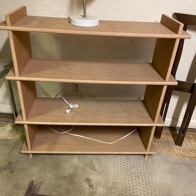 TWIN BED , BOOKSHELF AND LAMP