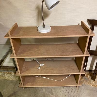 TWIN BED , BOOKSHELF AND LAMP