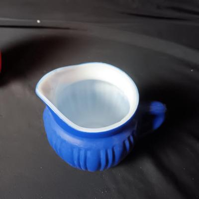 MID-CENTURY HAZEL ATLAS RIBBED GLASS CREAMERS