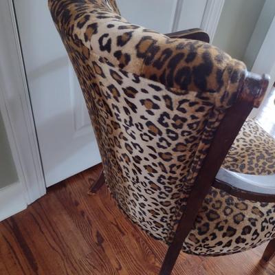 Carved Wood Framed Armchair with Flared Tufted Back Upholstered with Leopard Print