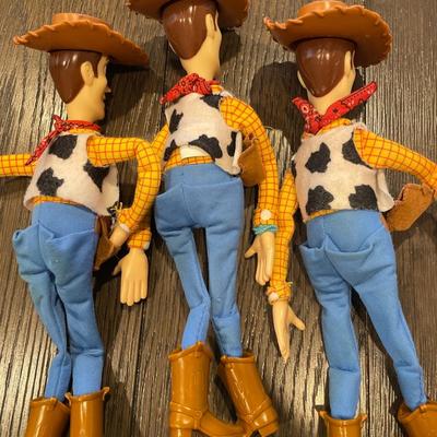 3 12â€ size Woody dolls