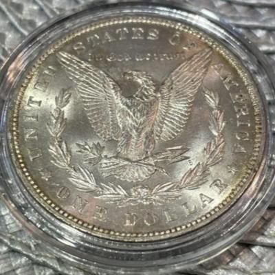 1880-P UNCIRCULATED CONDITION MORGAN SILVER DOLLAR AS PICTURED.