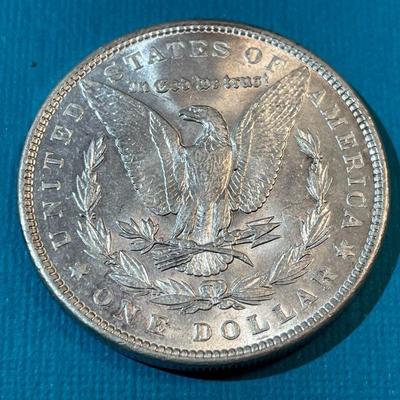 1889-P BU CONDITION MORGAN SILVER DOLLAR AS PICTURED.