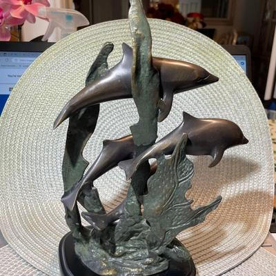 Vintage Mid-Century Bronze 4-Dolphins Figurines 10" Tall in Good Preowned Condition from an Estate. Back Side of the Base has a few...