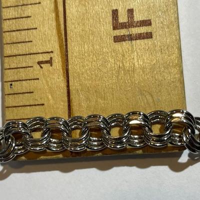 Vintage Sterling Silver Never Worn Condition 7.5" Long Charm Bracelet 1/3" Wide in Great Condition.