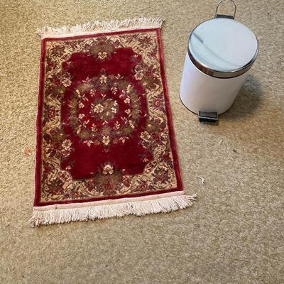PERSIAN STYLE RUG AND A SMALLER STEP TRASH CAN