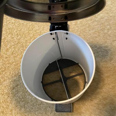 PERSIAN STYLE RUG AND A SMALLER STEP TRASH CAN