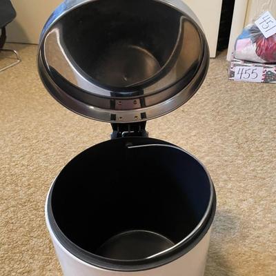 PERSIAN STYLE RUG AND A SMALLER STEP TRASH CAN