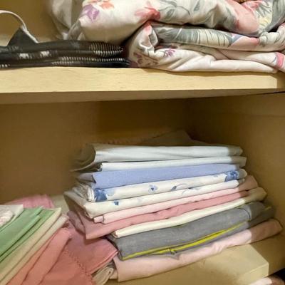 LINEN CLOSET FULL OF TOWELS, SHEETS AND BLANKETS