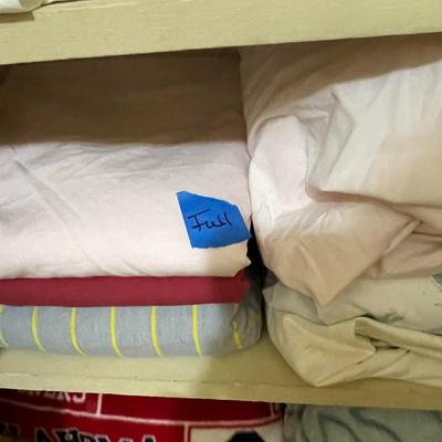 LINEN CLOSET FULL OF TOWELS, SHEETS AND BLANKETS