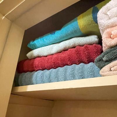 LINEN CLOSET FULL OF TOWELS, SHEETS AND BLANKETS