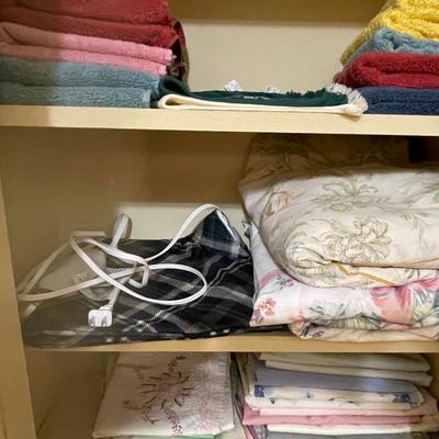 LINEN CLOSET FULL OF TOWELS, SHEETS AND BLANKETS