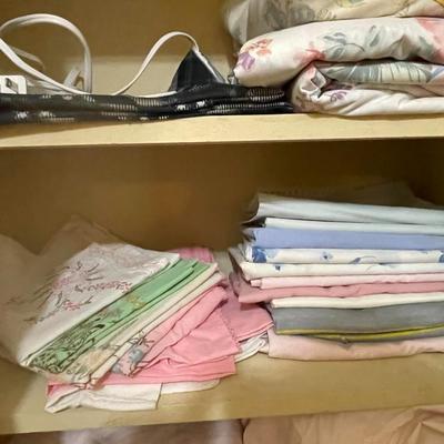 LINEN CLOSET FULL OF TOWELS, SHEETS AND BLANKETS