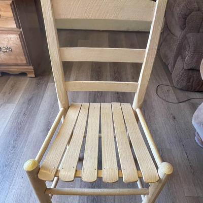 3 SHELF BOOKCASE AND A WOODEN CHAIR