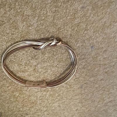 BELTS, BEADED COLLAR AND BARRETTES